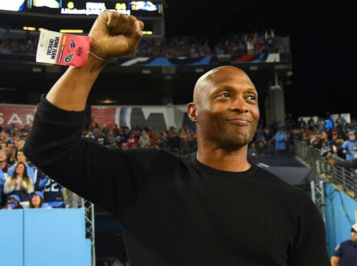Former Tennessee Titans running back Eddie George waives to the fans during the second half against the Buffalo Bills at Nissan Stadium.